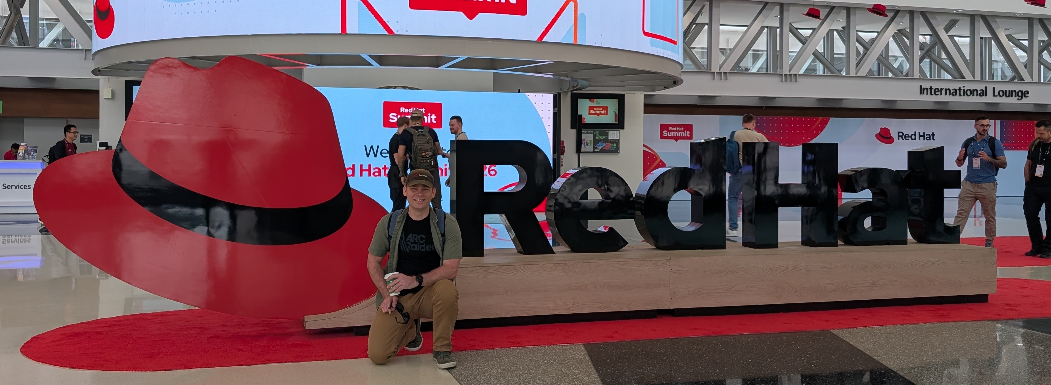 Red Hat Summit 2026 · Garrett Holland
